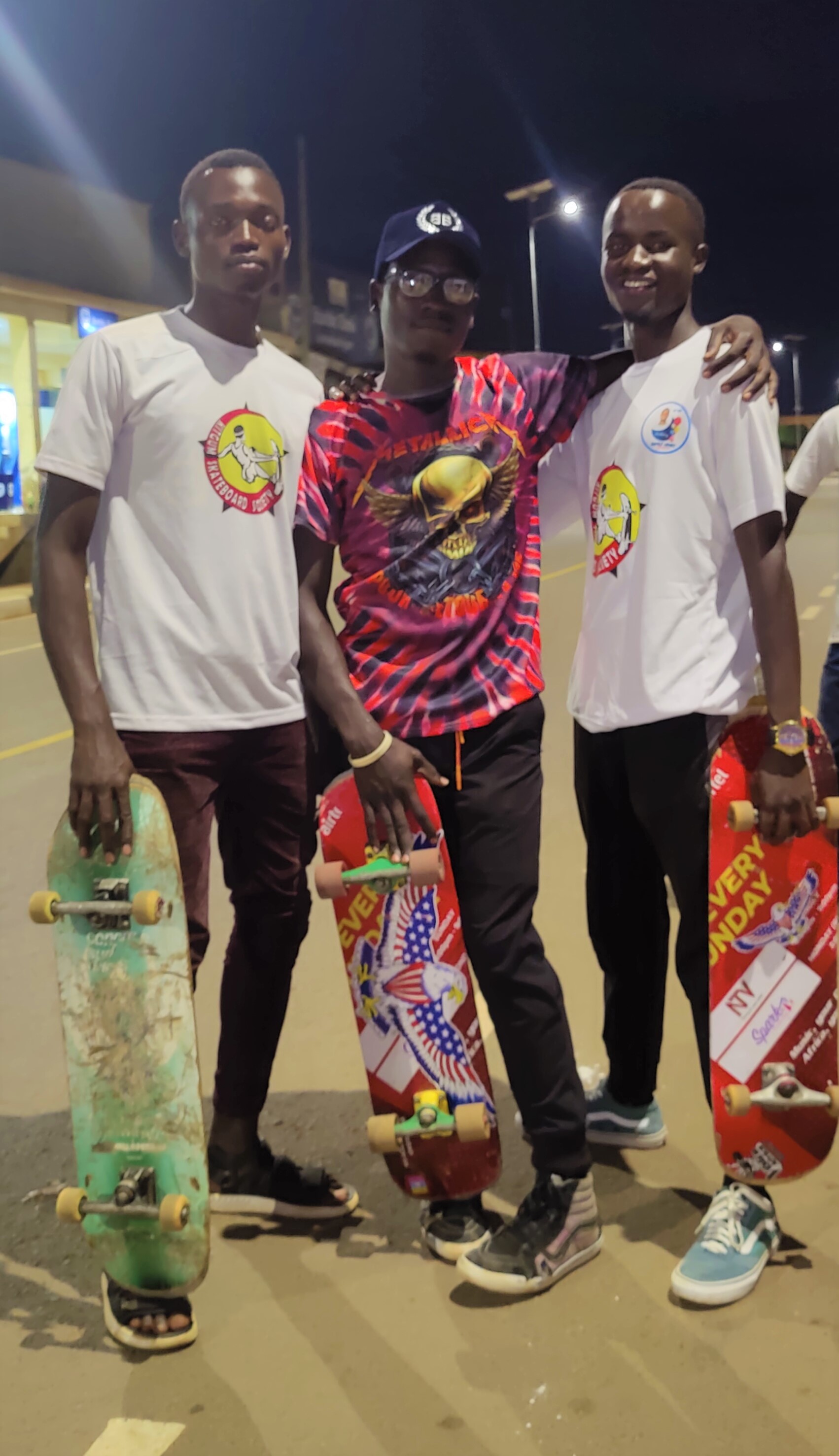 KiSS Skateboard members skating at Stanbic Street