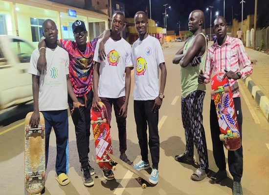 KiSS Skateboard members skating at Stanbic Street